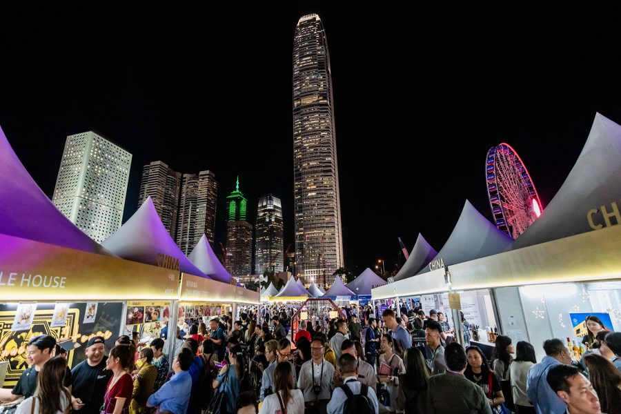 Booths at the Hong Kong Wine & Dine Festival with the IFC in the background.