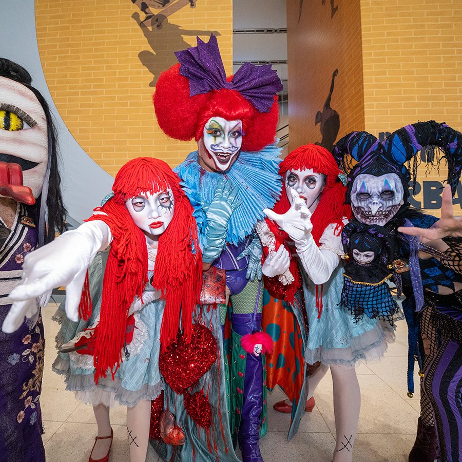 Mascots and scary clowns pose at Ocean Park’s Halloween Fest.