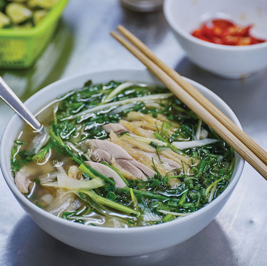 A bowl of pho ga chicken noodle soup