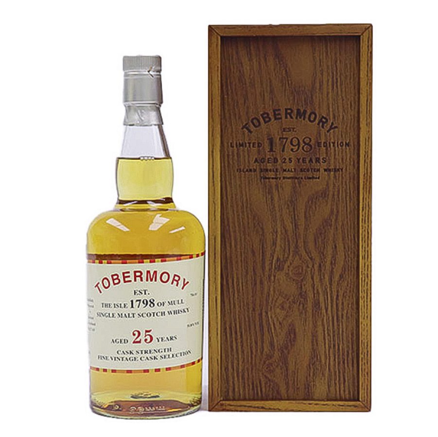 A bottle of Tobermory 25-Year-Old Single Malt Scotch Whisky next to its wooden box. 
