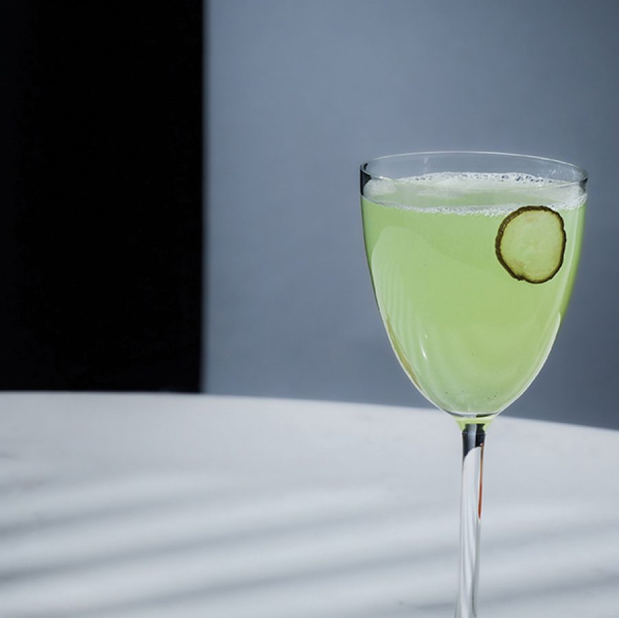 Green-coloured Pickled Cucumber Gimlet cocktail at Avoca.  