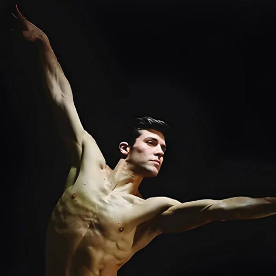 American Ballet Theatre principal dancer Roberto Bolle dancing with his arms outstretched.