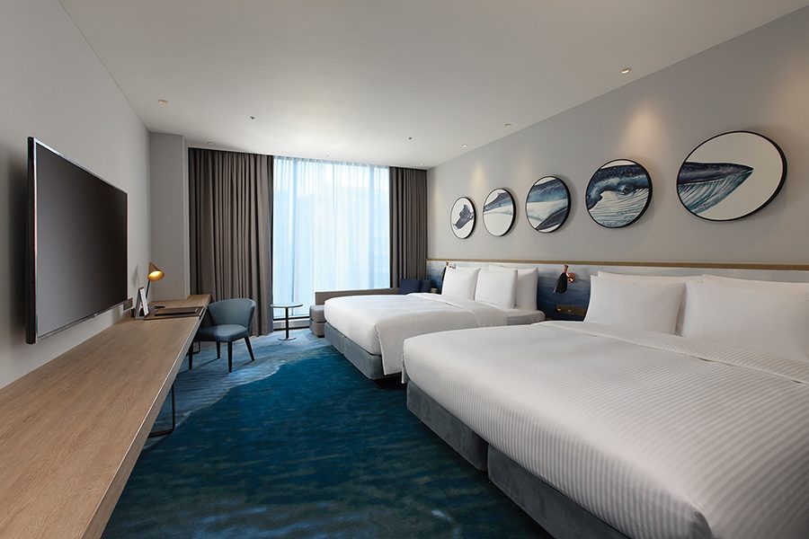 Interior of a guest room at COZZI Blu Taoyuan.