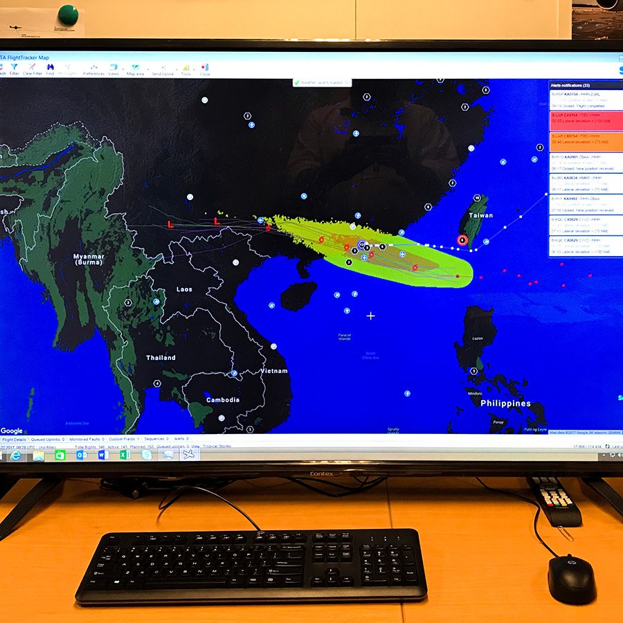 A computer screen showing the direction of super typhoon Hato near South China Sea 