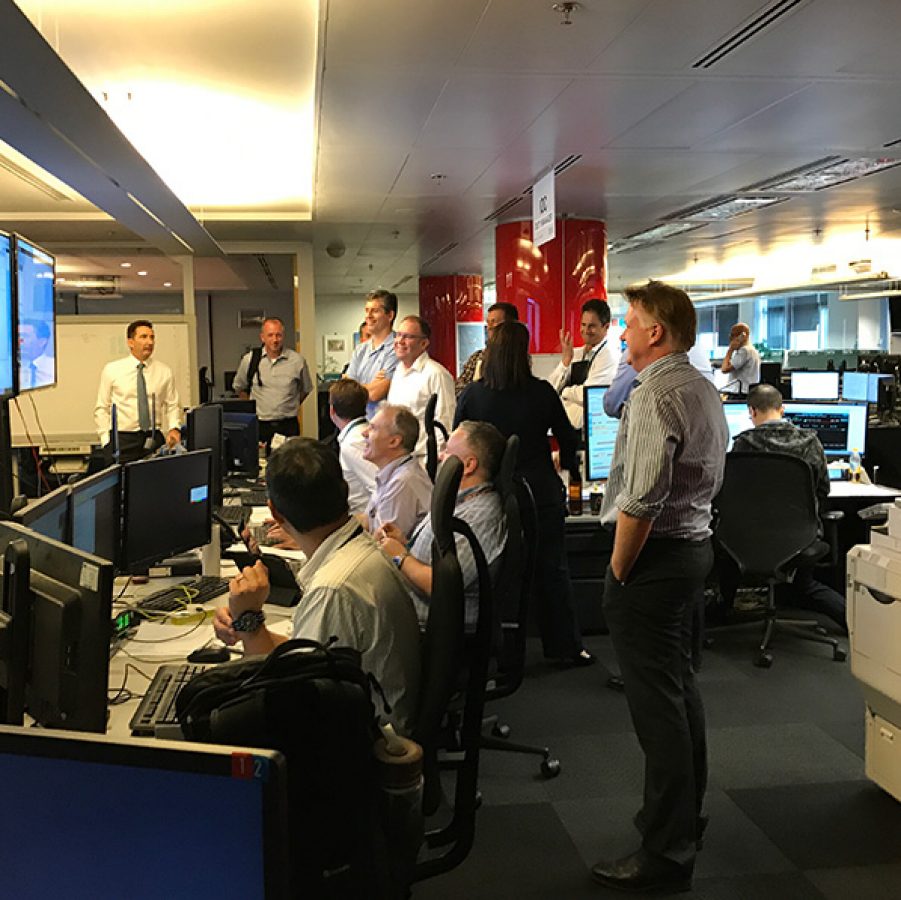 People and managers in the Integrated Operations Centre (IOC) at Cathay Pacific’s headquarters observing typhoon hato from computer screens