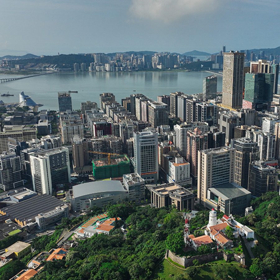 Aerial view of Macao, with the HZMB in the background.