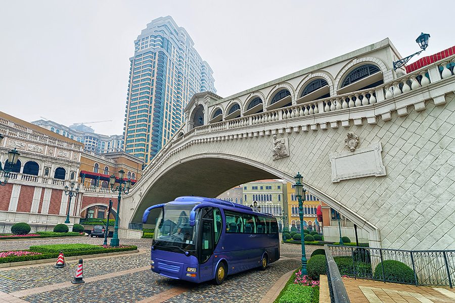 A hotel shuttle bus on the road in Macao. 