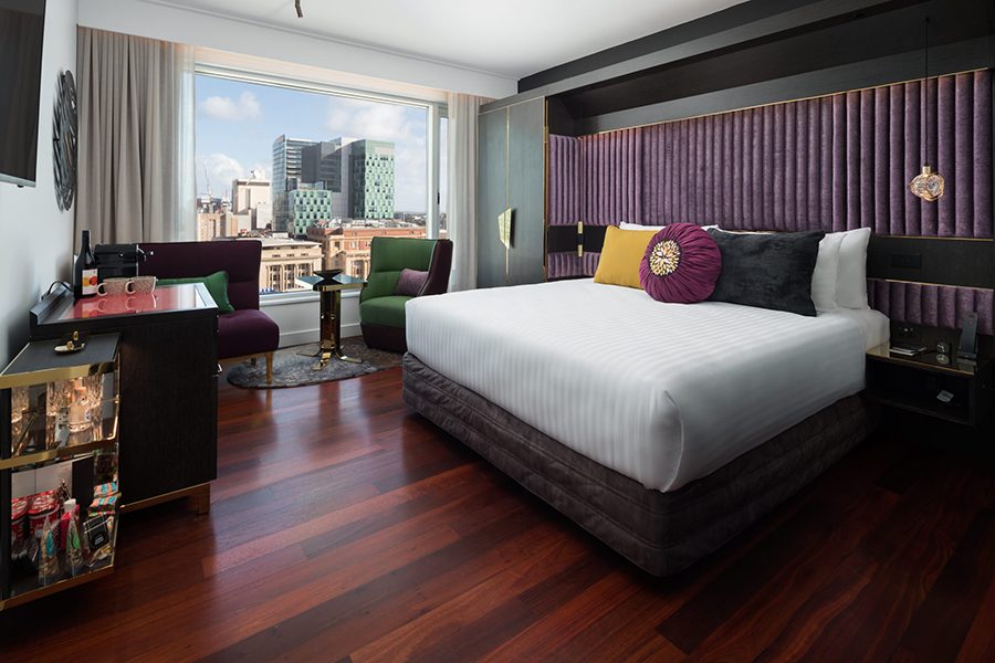 Hotel room interiors at QT Perth.