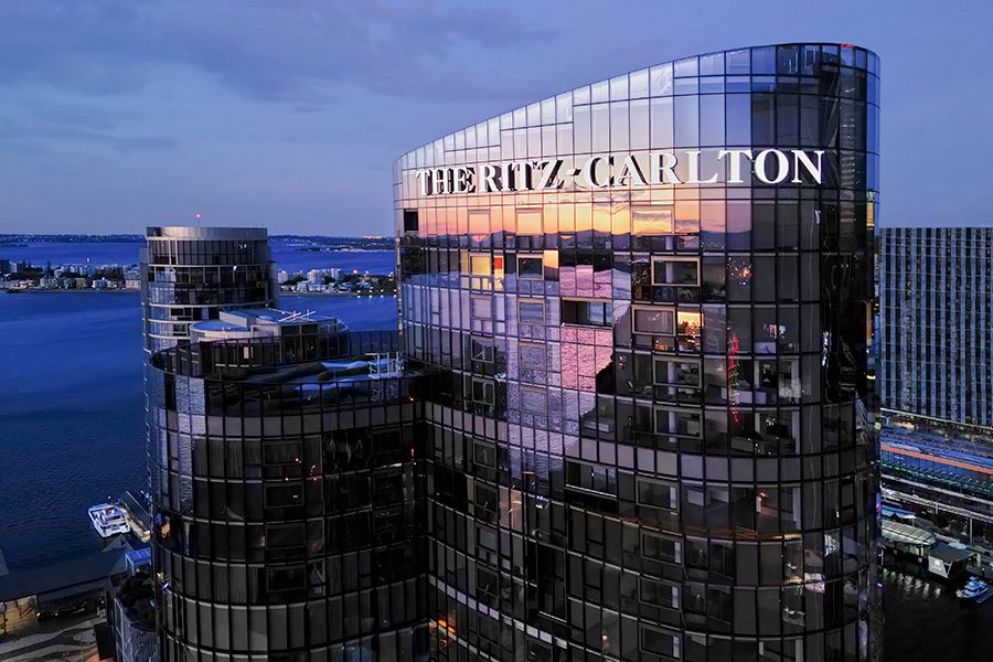 Exterior view of The Ritz Carlton, Perth and logo.