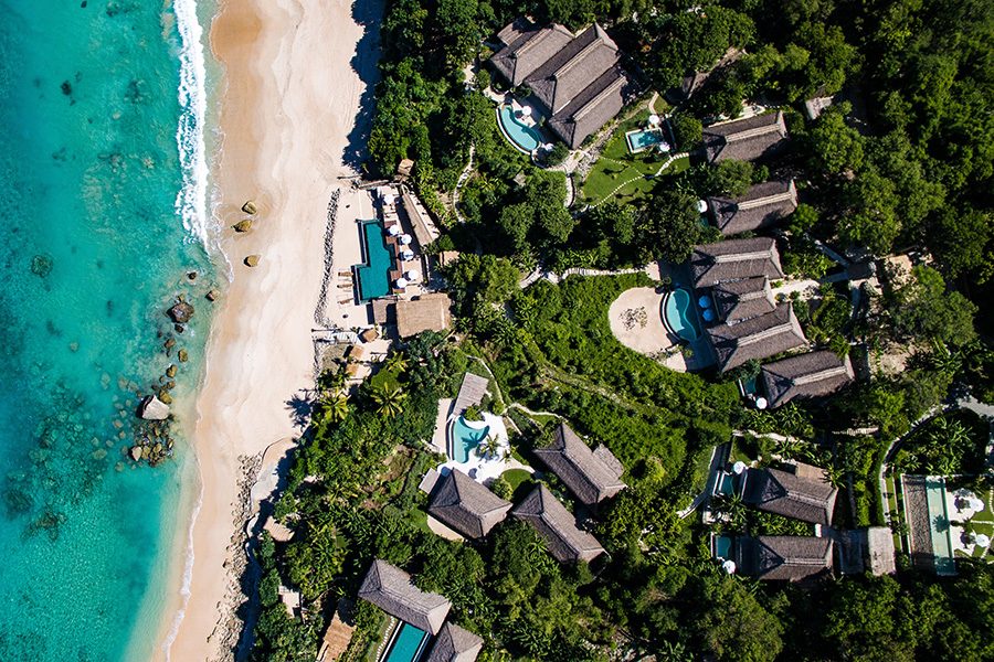 A top down drone shot of NIHI Sumba resort and beach 