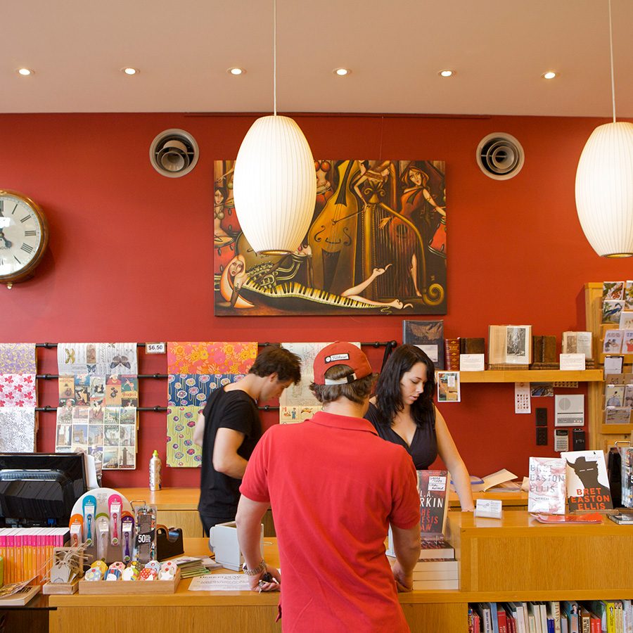 The red-walled interior of Berkelouw Books in Sydney