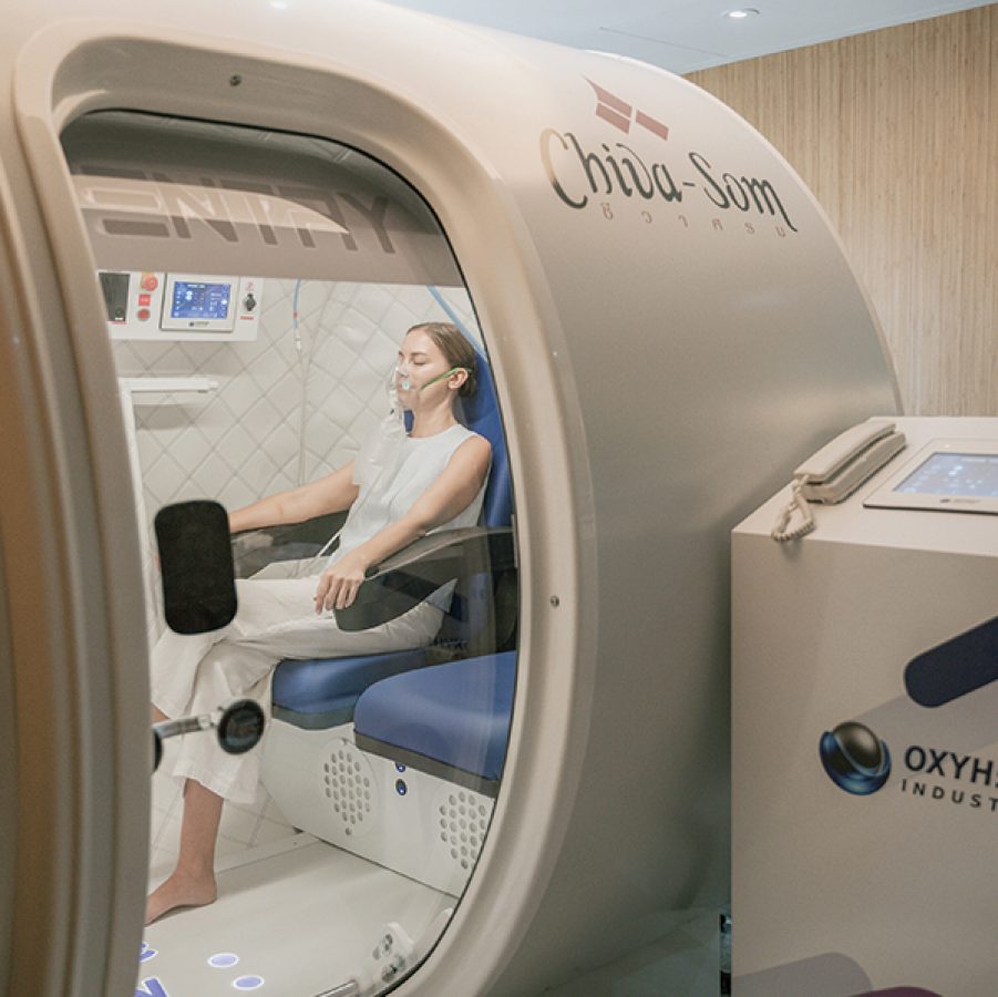 A hotel guest inside a hyperbaric oxygen chamber for therapy at Chiva-Som Hua Hin, a resort in Thailand.