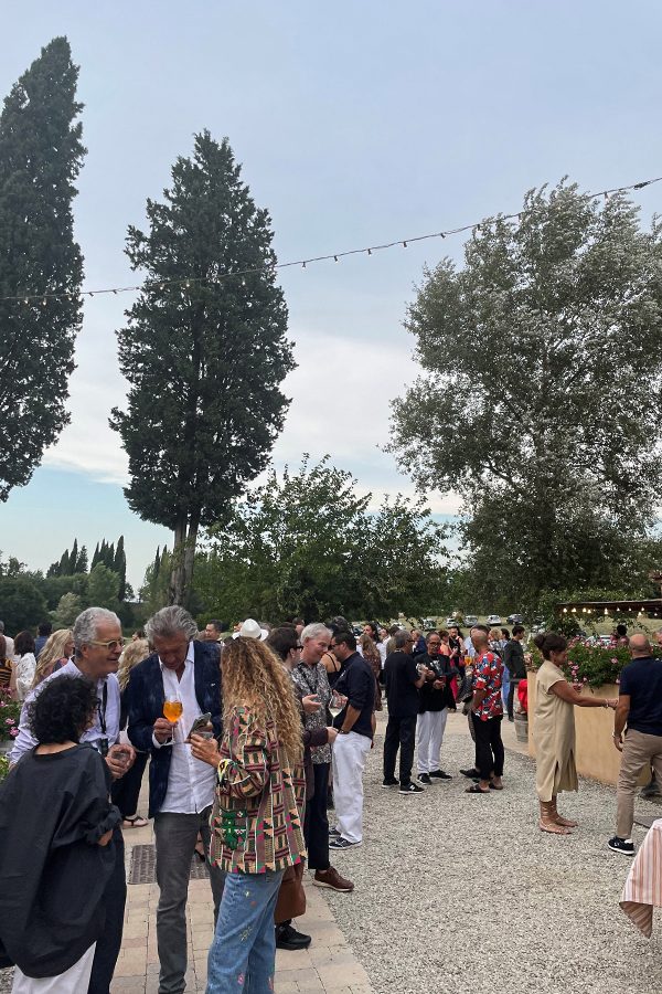 Guests mingling before dinner at Il Palagio. 