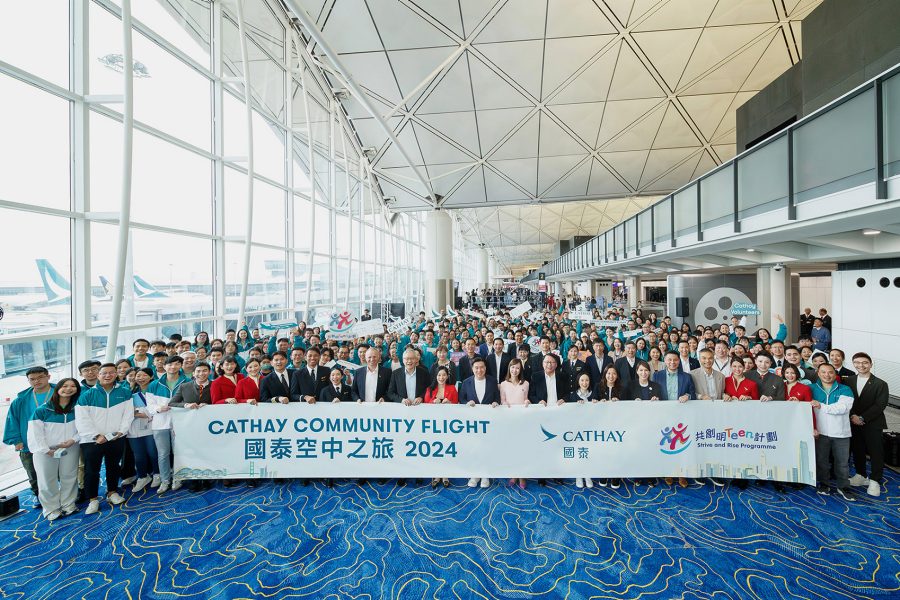 A group shot of Cathay members and passengers involved with our 2024 Community Flight.