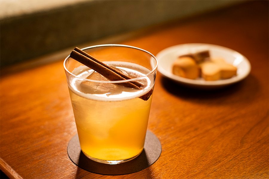 A close up shot of the seasonal Remy Martin with apple cocktail at the Cathay Lounge.