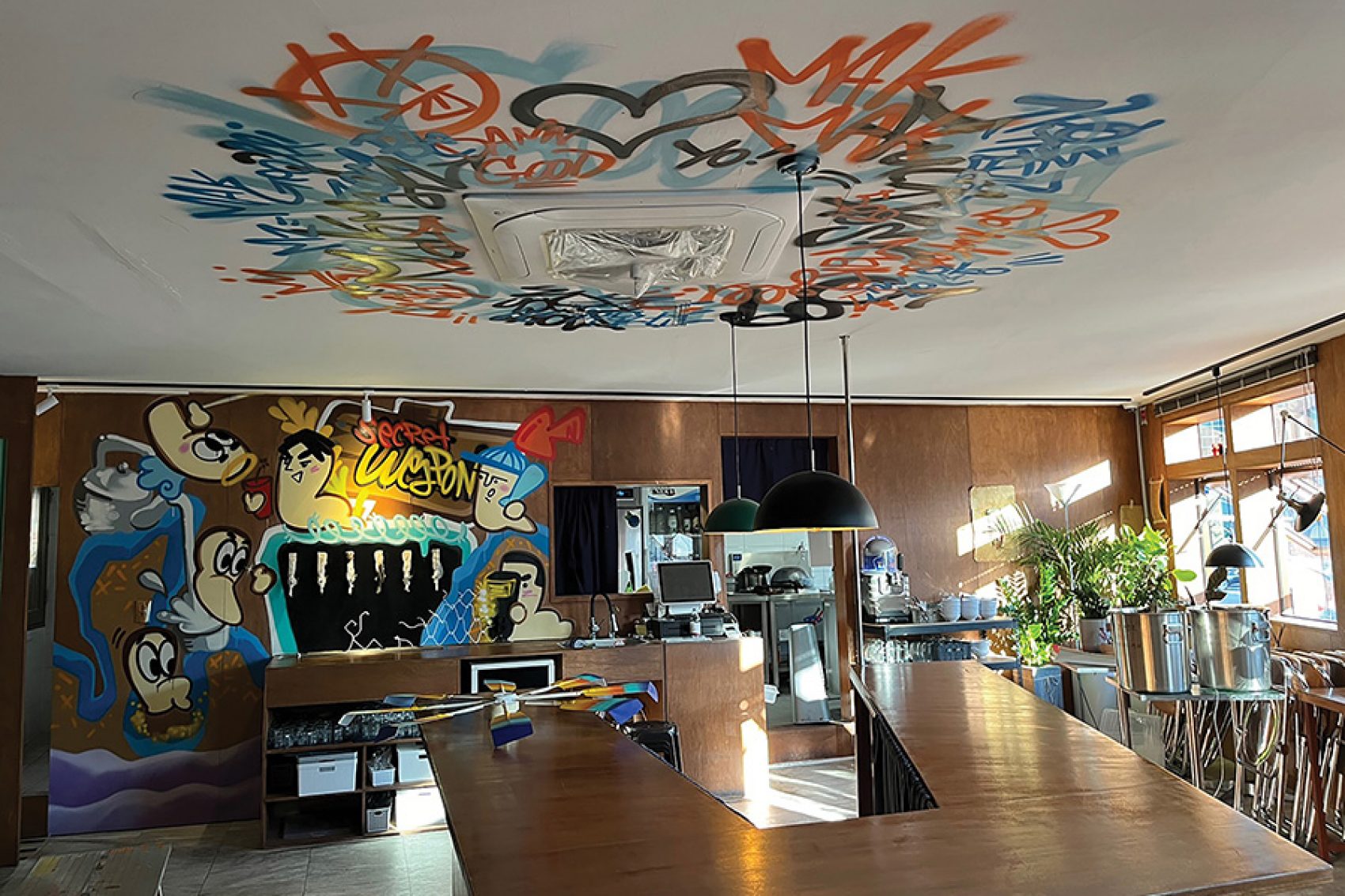 The brightly decorated interior of Woori Yeahsool in Seoul.