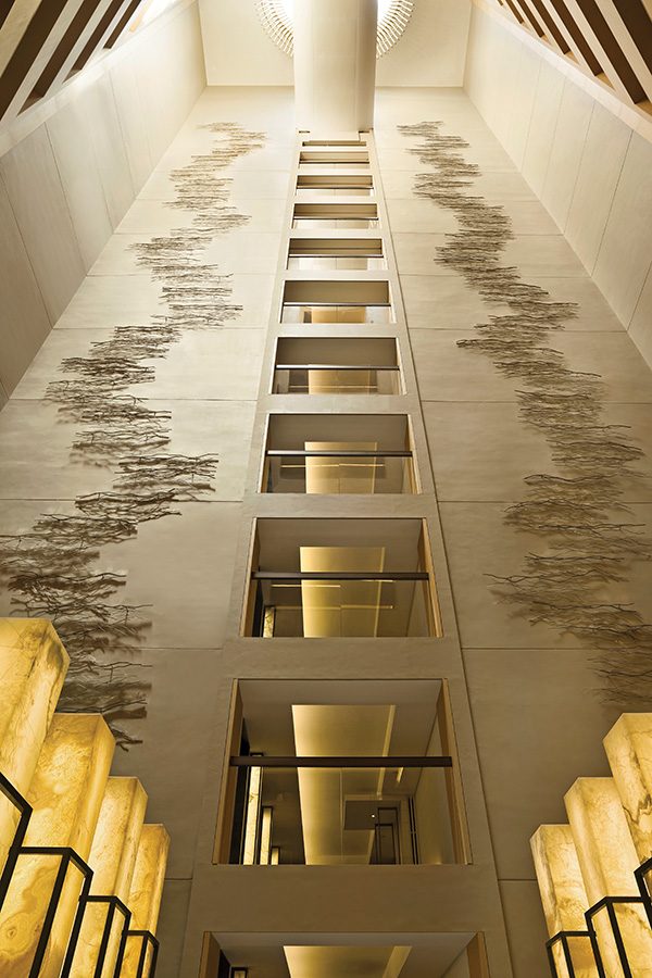 A decorated wall in the lobby of The Upper House
