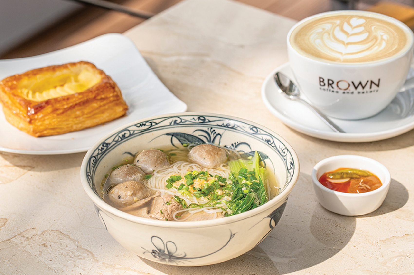 Noodle bowl and coffee at Brown in Phnom Penh