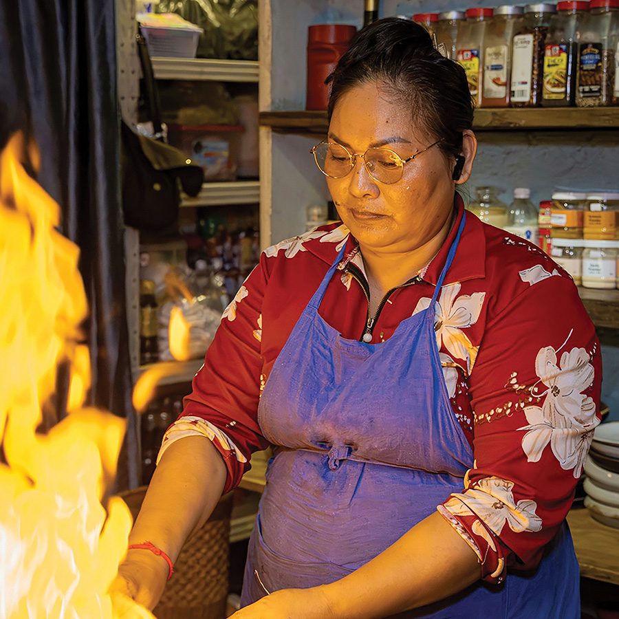 Chef at Nesat Seafood House cooking