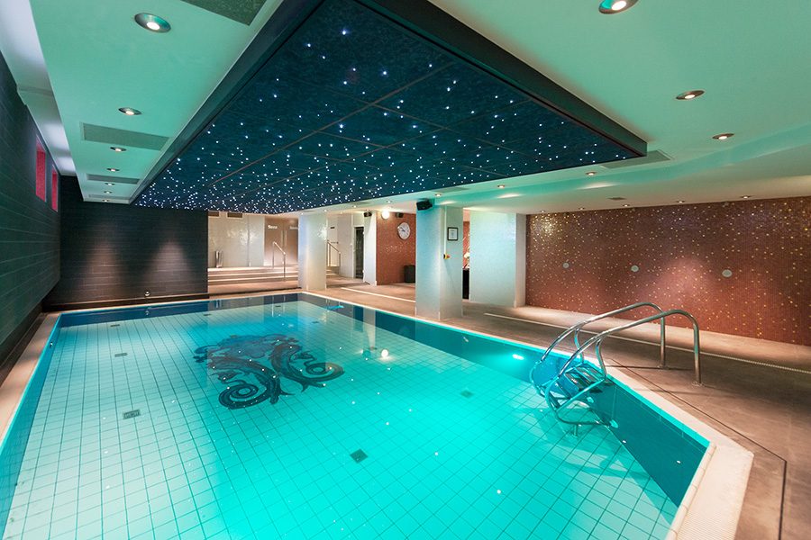 An indoor pool inside Grand Hotel Amrâth Amsterdam.
