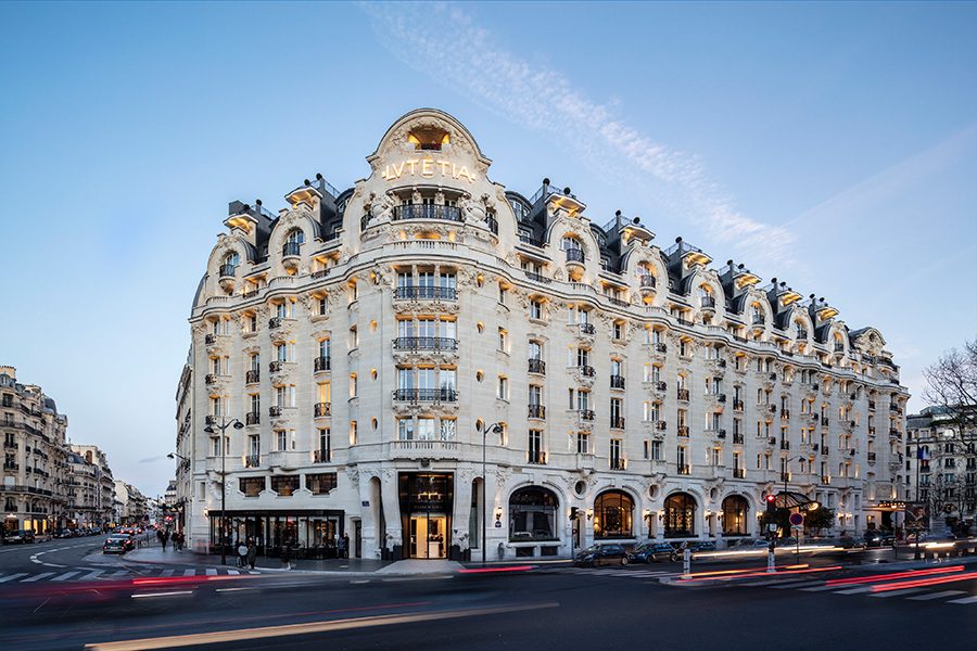 The exterior of Hotel Lutetia on a busy street.