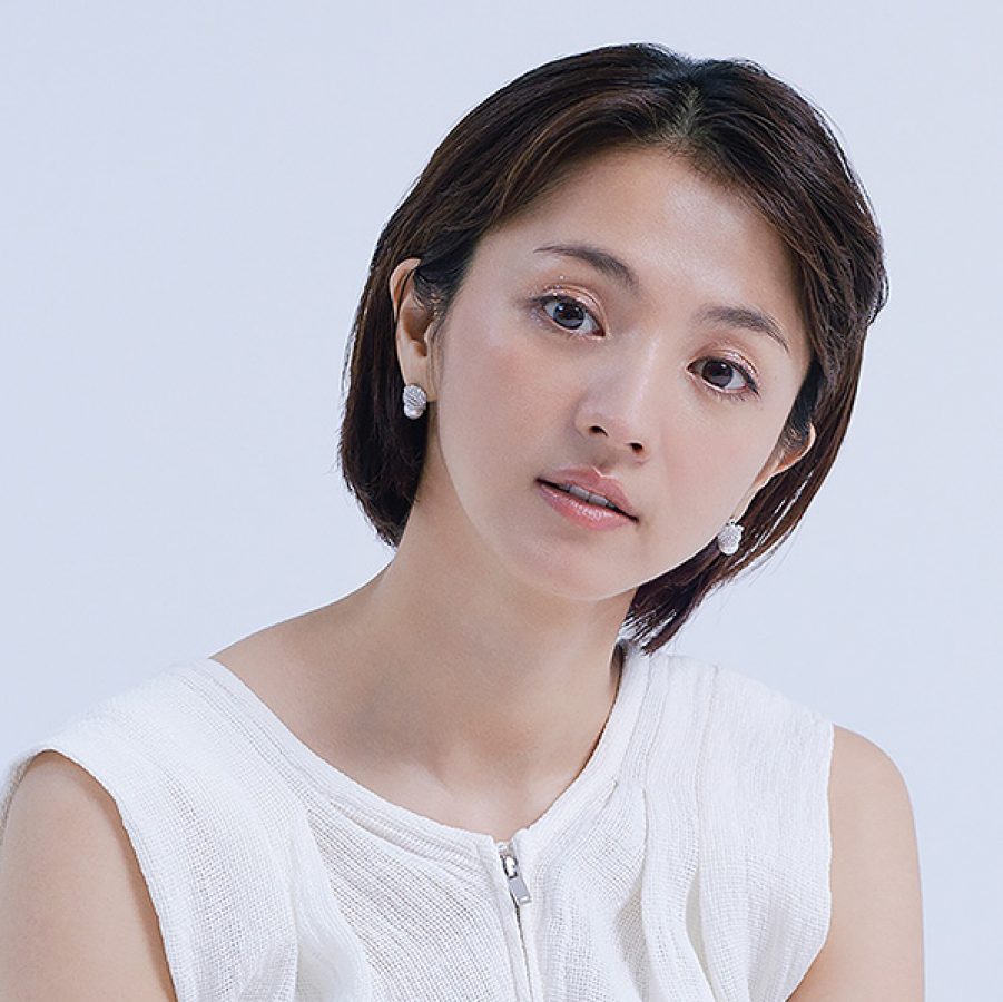 Japanese actor and musician Hikari Mitsushima in front of a white background.