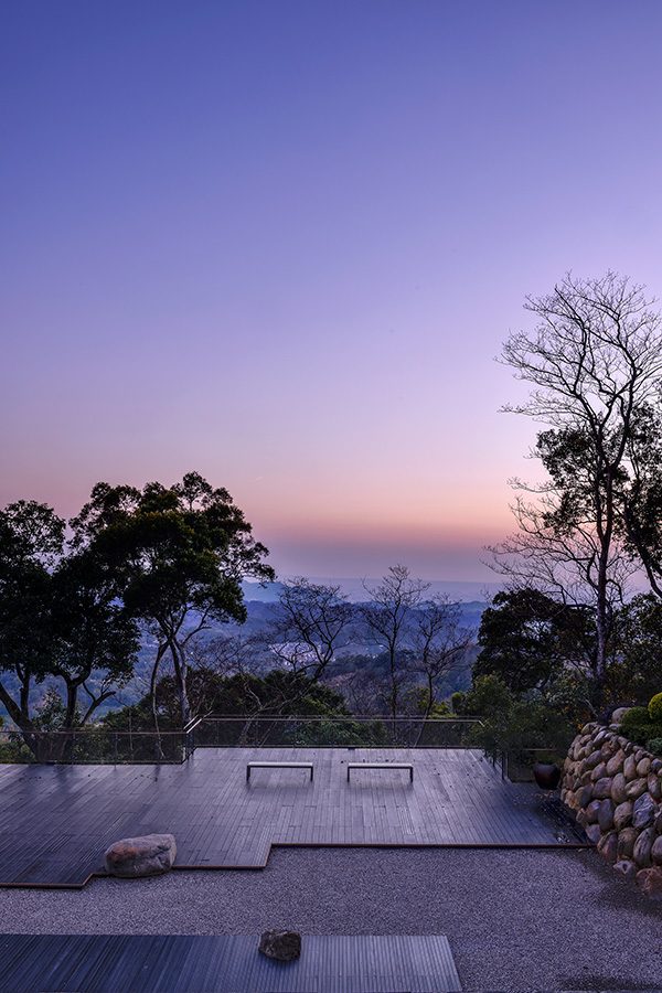 View at twilight from Inflorescence of the courtyard and the mountains below. 