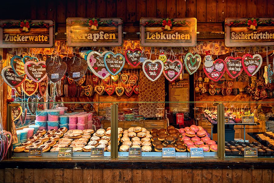 A stall at a Vienna Christmas market selling cookies and pastries. 