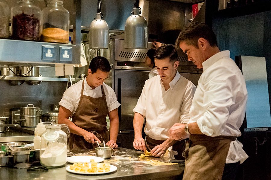 Shane Osborn with his team at Arcane.