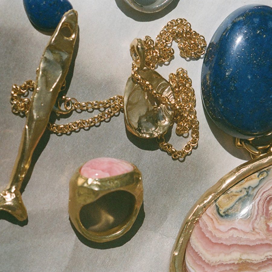 Close up view of Alighieri pendants and rings