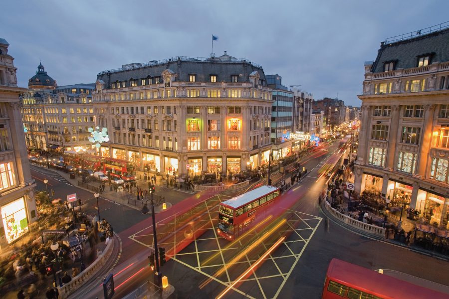Intersection in London with bus driving through
