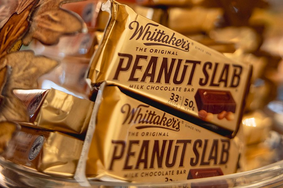 A stack of Whittaker’s Peanut Slabs piled high on a tray. 