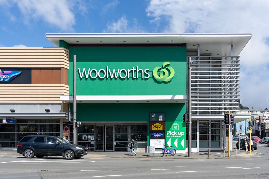 Exterior of a Woolworths supermarket in New Zealand next to the road.