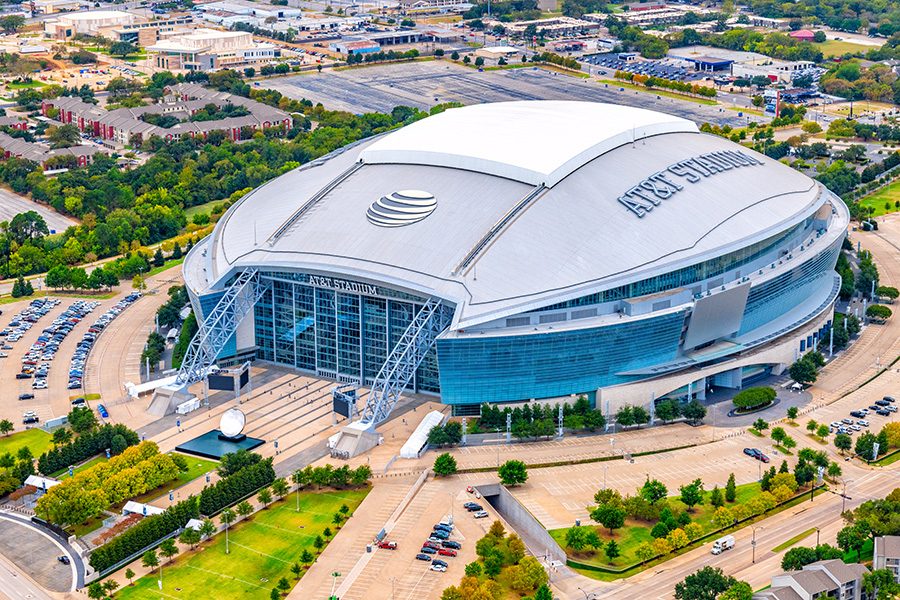 The exterior of the AT&T Stadium on a sunny day. 