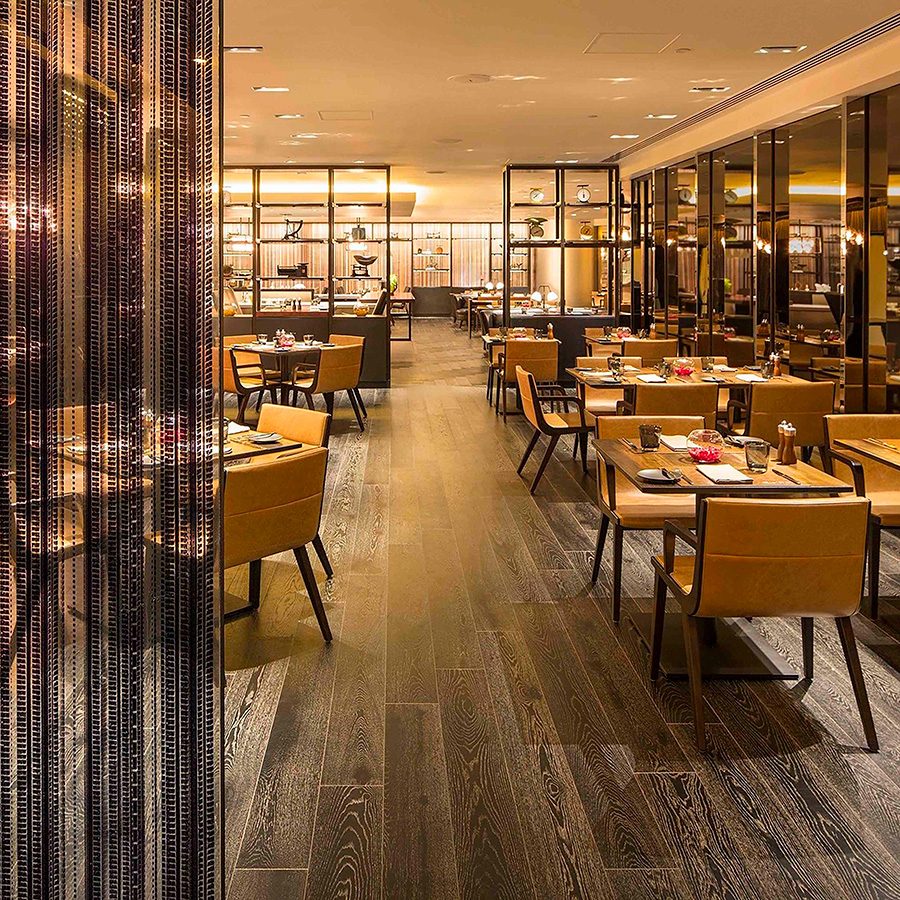Elegant interior of the dining room in Flint restaurant in JW Marriott Hotel Hong Kong.