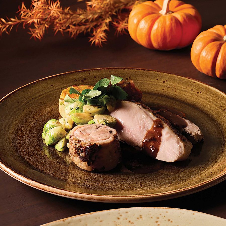 A close up of a slice of orange thyme-brined turkey served at Flint in JW Marriott Hotel Hong Kong.