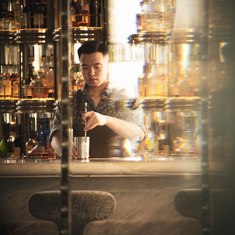 Bartender Evan Mak stirring a drink at ARGO, Hong Kong. 