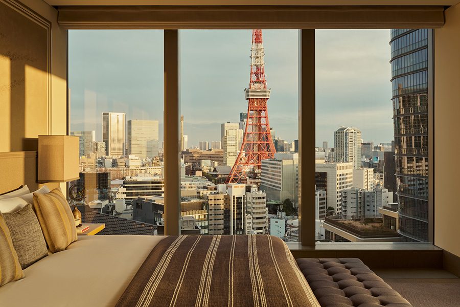 A view of Minato city seen from inside a bedroom suite at Janu Tokyo hotel.