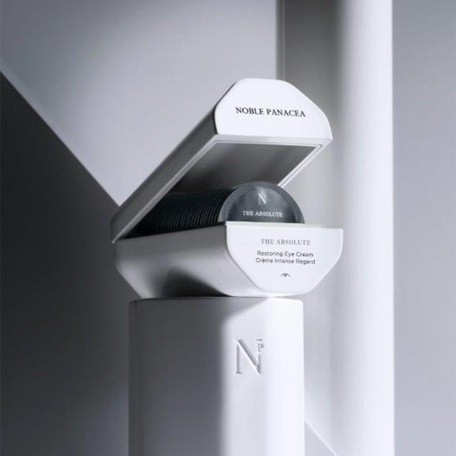 A luxe white box of Noble Panacea the absolute restoring eye Cream 