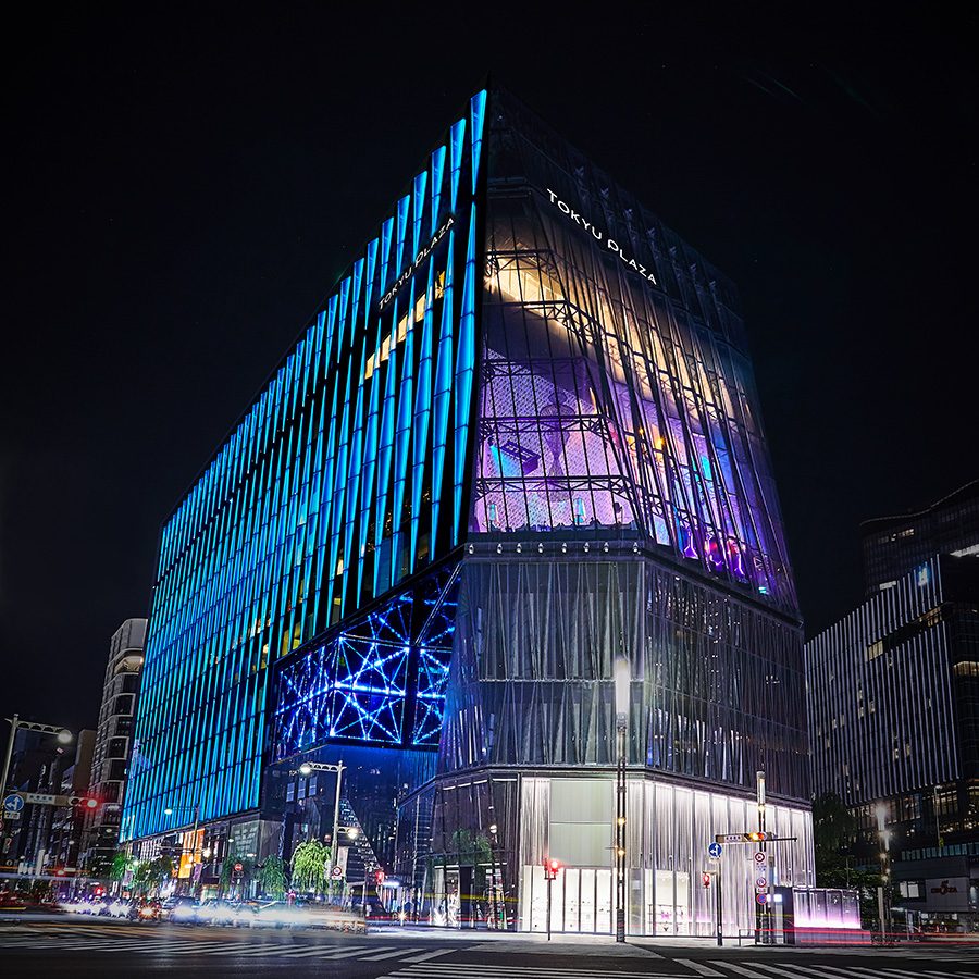 Façade of the lit-up Tokyo’s Tokyu Plaza Ginza at night, home to Lotte Duty Free Ginza.