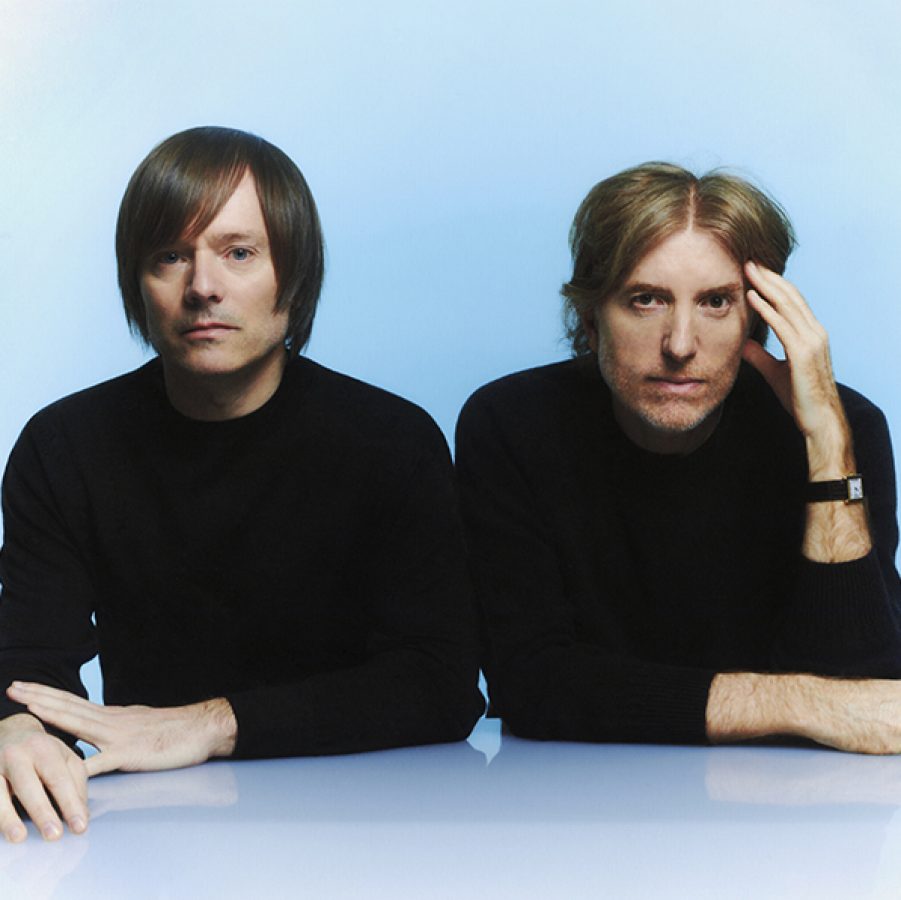 French band Air, featuring Jean-Benoît Dunckel and Nicolas Godin together on a blue background.