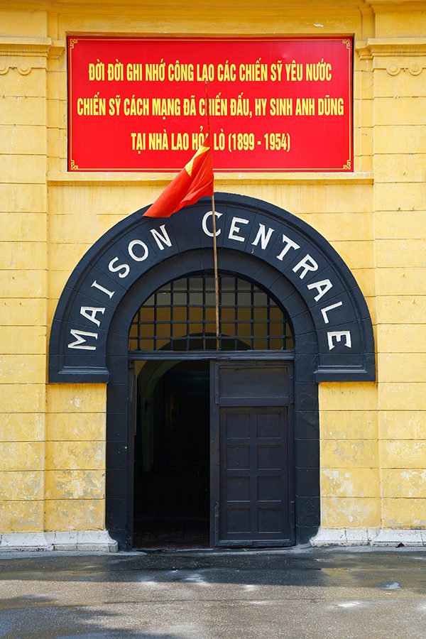  The entrance of Hanoi’s Hoa Lo Prison in the daytime.