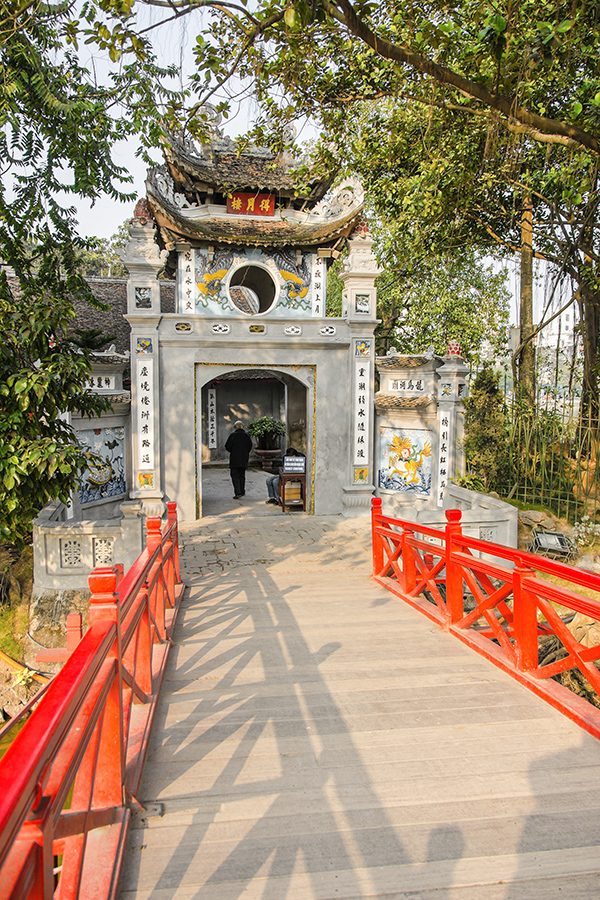 The bridge leading to the entrance of Ngoc Son Temple in Hanoi in the daytime.