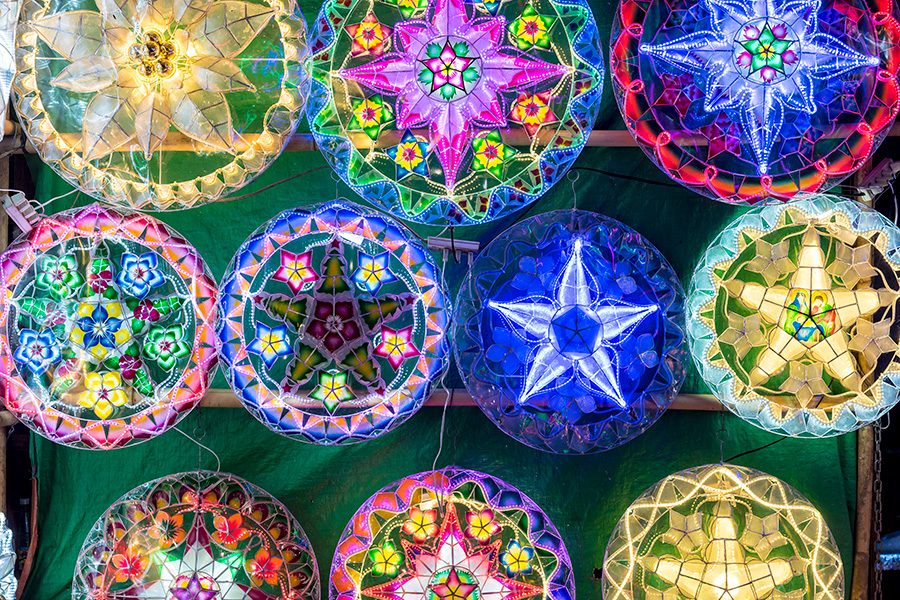 Bright parols hung up for sale in the Philippines during Christmas.