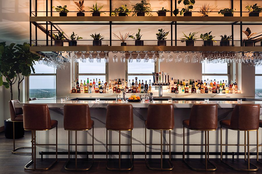 View of the bar at the Kimpton Harper Hotel.