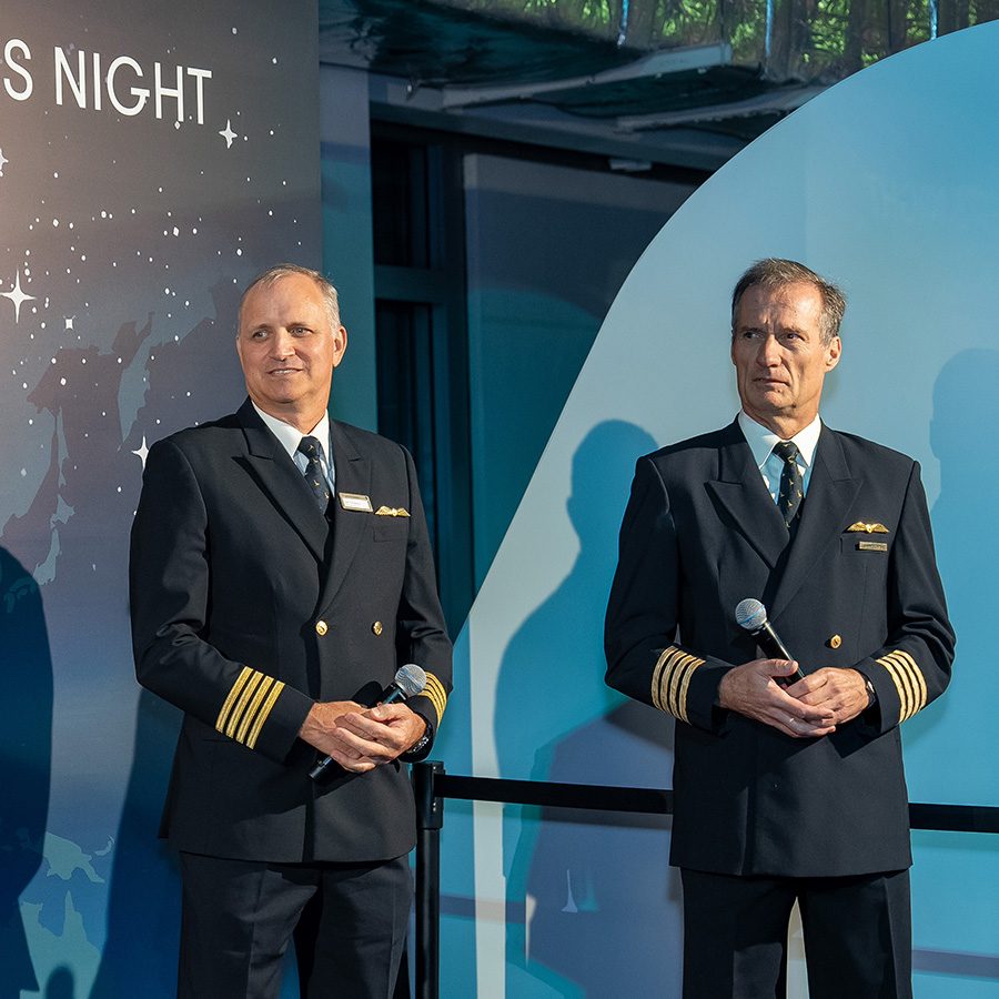 Cathay Director Flight Operations Captain Chris Kempis and General Manager Flying Captain Tim Burns welcome the Million Milers into the Flight Training Centre, which has on display training models of Cathay’s different aircraft cabins.