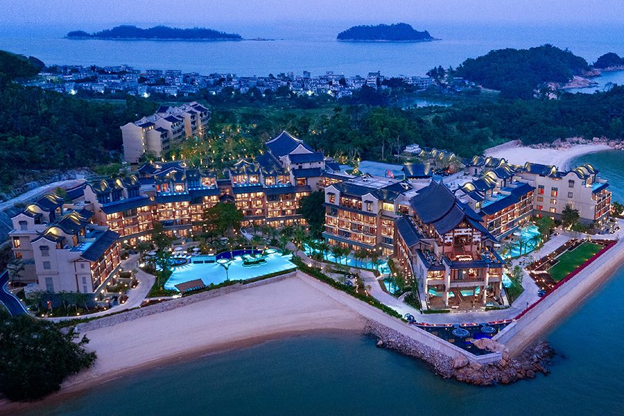 An aerial shot of Angsana Zhuhai Phoenix Bay resort hotel at dawn.