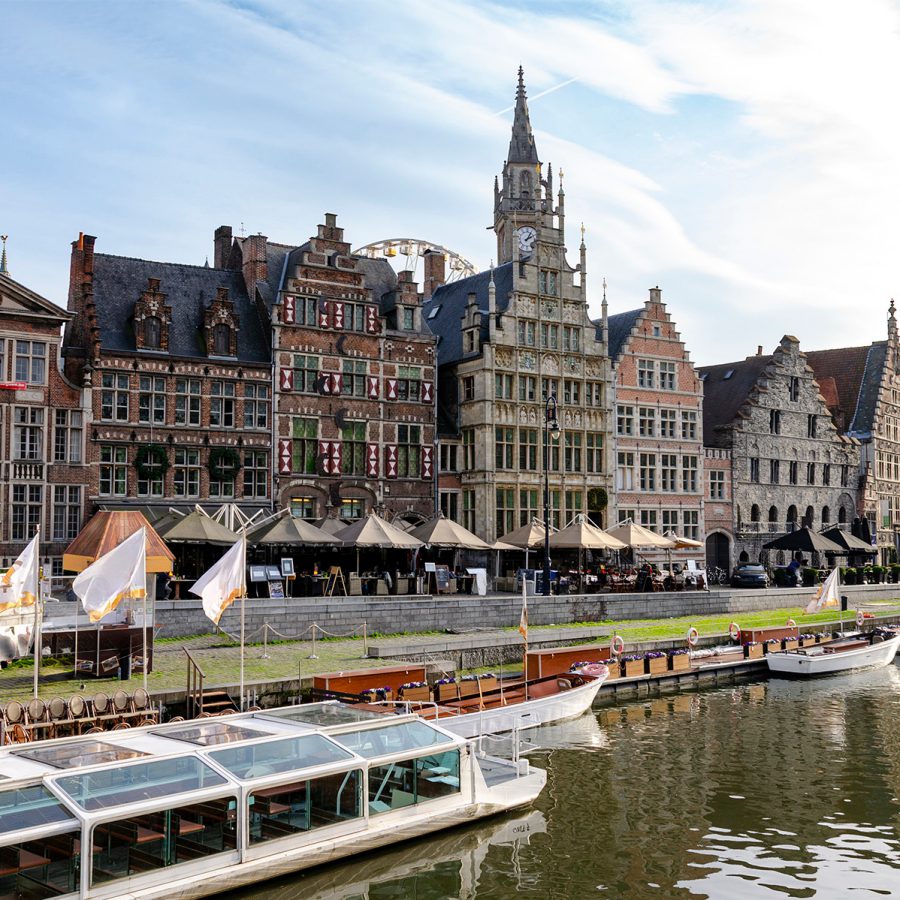 A row of buildings by a canal in Ghent, Belgium.
