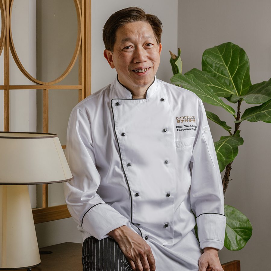Chan Yau Leung, executive chef at Duddell’s, sits on a cabinet and poses for a picture.