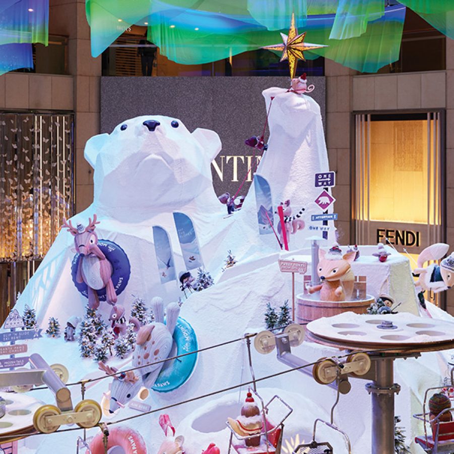 A huge polar bear, snowy mountain and northern light Christmas decoration at luxury shopping mall Landmark in Central.